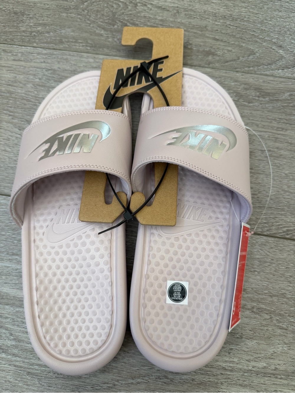 Nike Slide Sandals in Pale Pink with Iridescent Logo